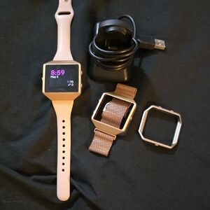 Fitbit Smartwatch with Pink Band and Accessories